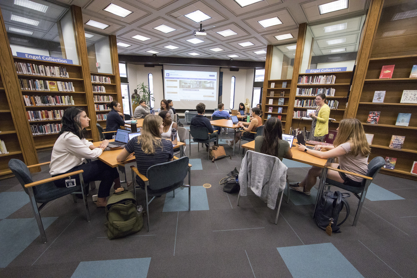 Class session held in the reading room of the library.